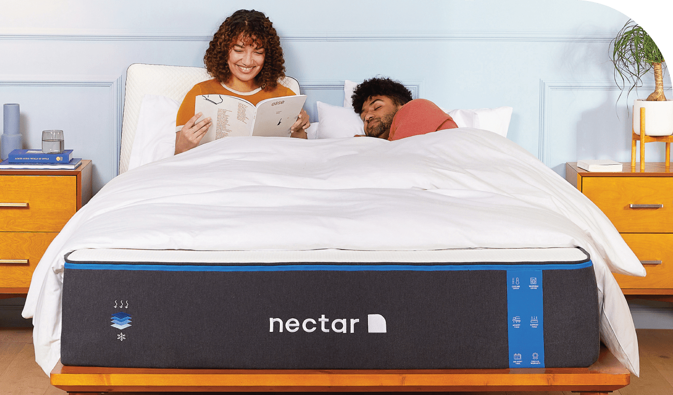 Couple resting on a Nectar mattress